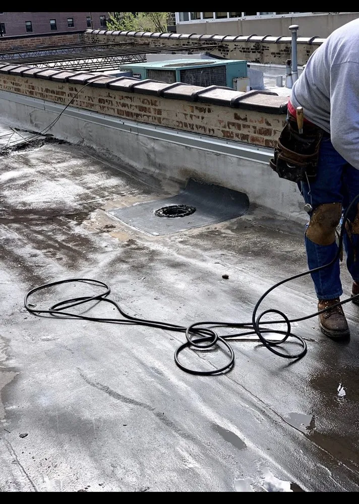 Slide of Ross Roofing