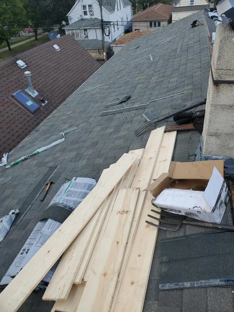 Slide of Ross Roofing