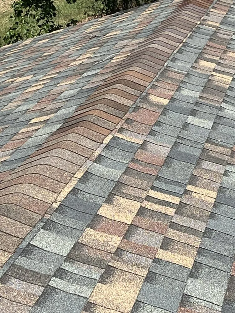 Slide of Ross Roofing