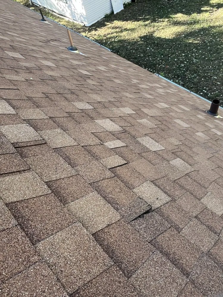 Slide of Ross Roofing