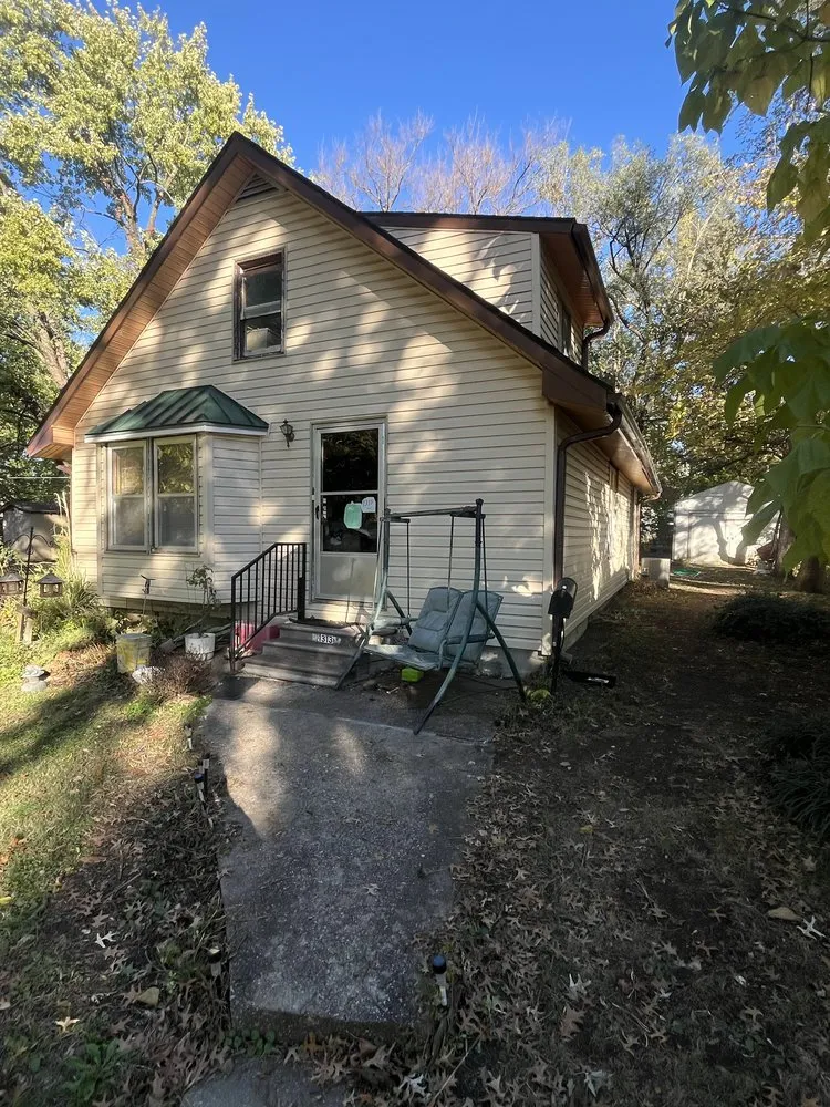 Slide of Ross Roofing