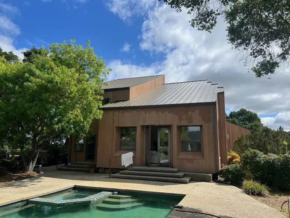 Slide of Rossetta's Roofing