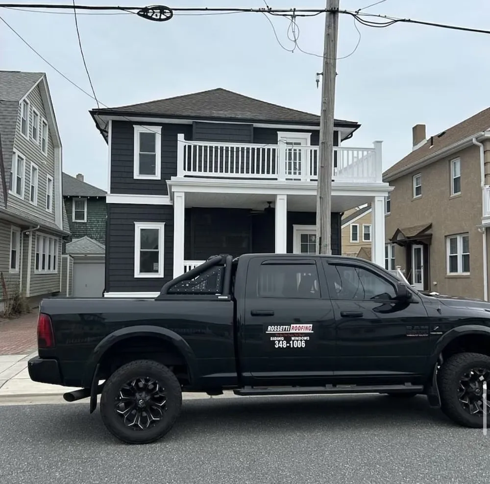 Slide of Rossetti Roofing