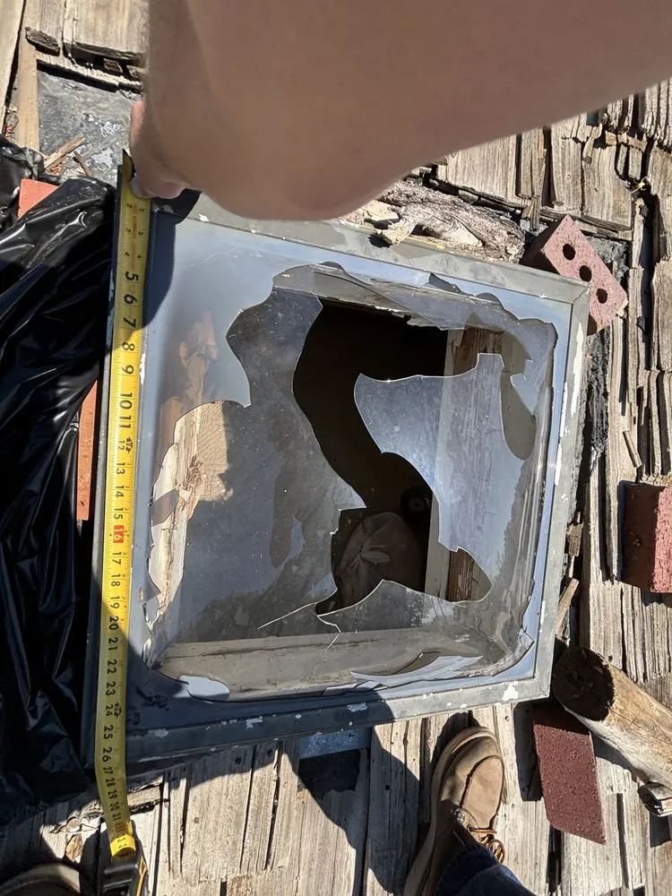 Slide of Rossignol Roofing