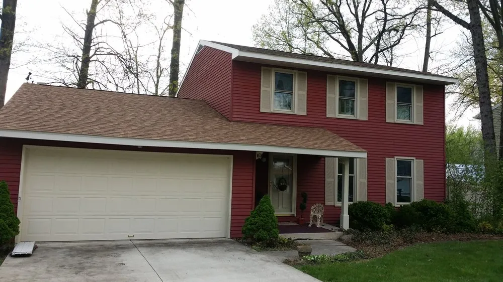 Slide of Roszman Roofing and Remodeling