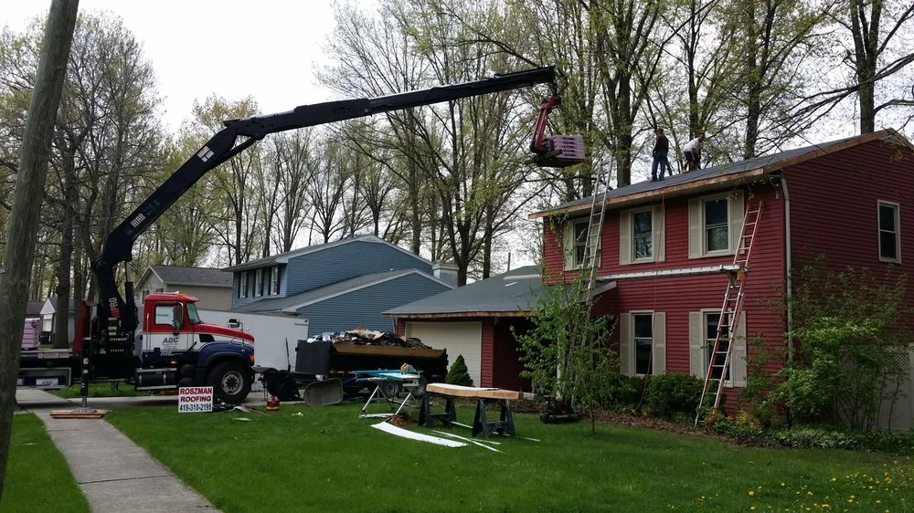 Slide of Roszman Roofing and Remodeling