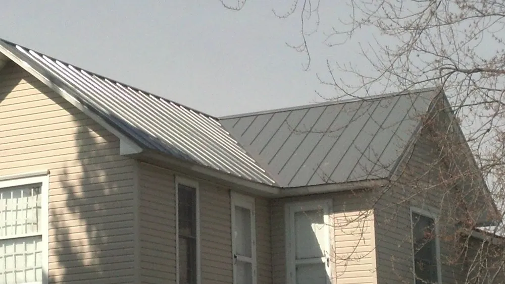 Slide of Roszman Roofing and Remodeling