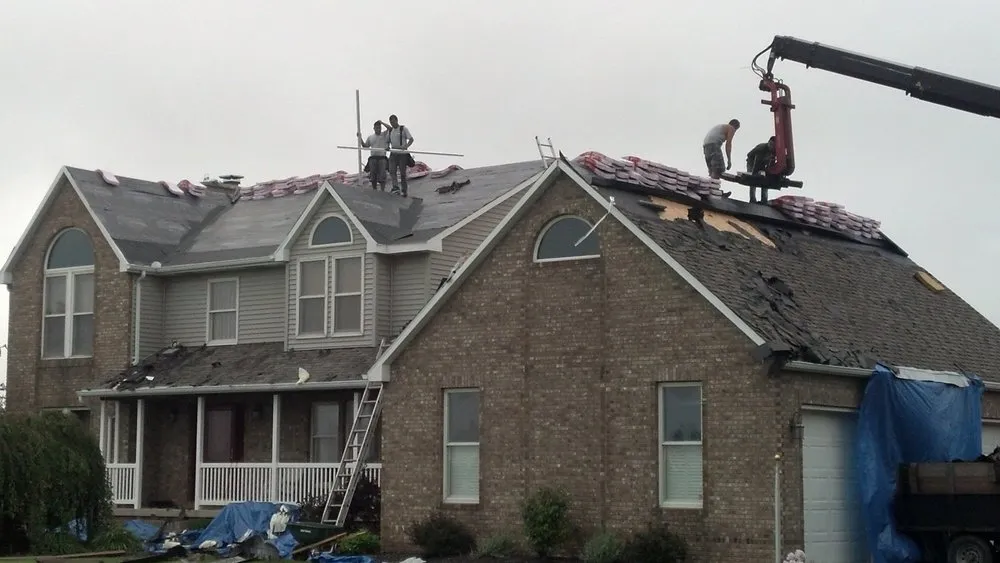 Slide of Roszman Roofing and Remodeling