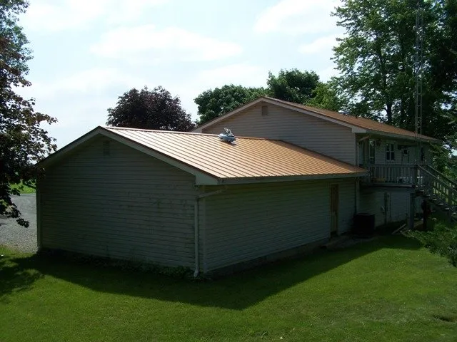 Slide of Roszman Roofing and Remodeling