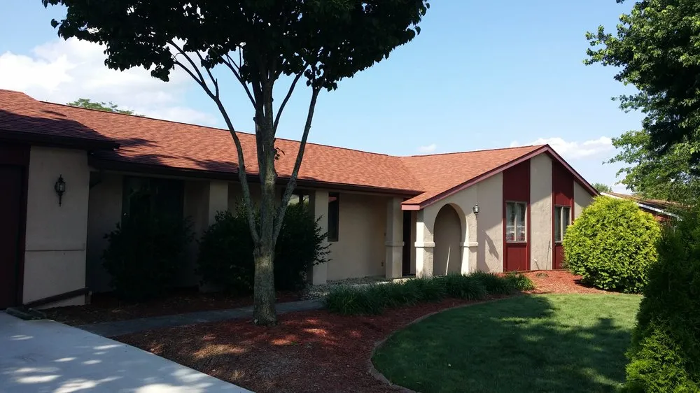 Slide of Roszman Roofing and Remodeling