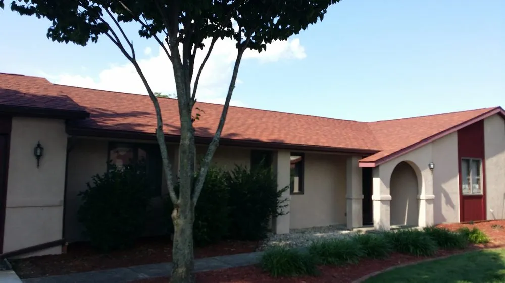 Slide of Roszman Roofing and Remodeling