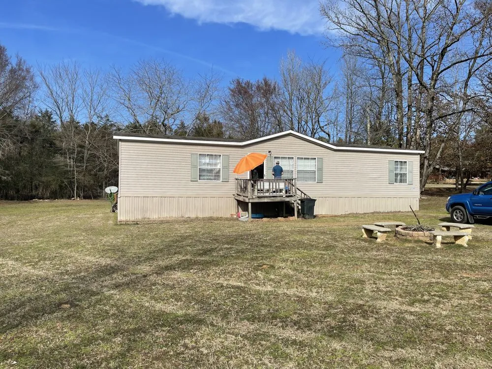 Slide of Rough Ridge Roofing