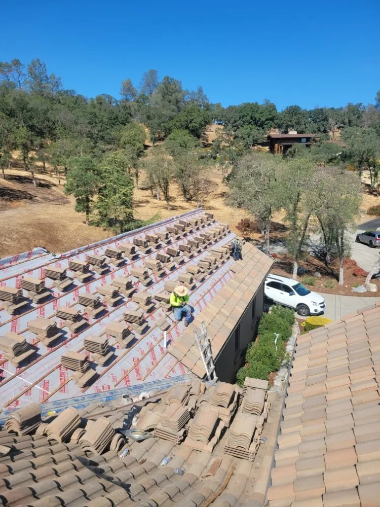 Slide of Rouse Roofing