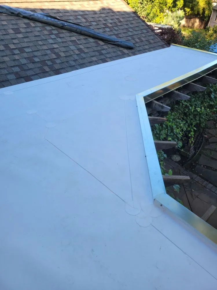 Slide of Rouse Roofing