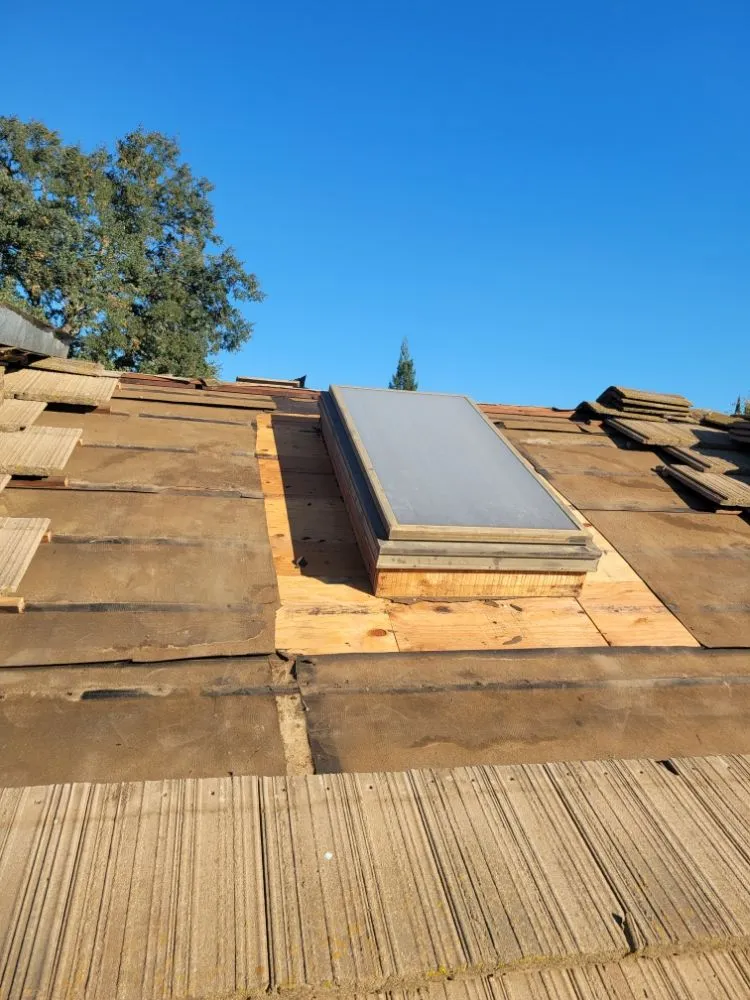 Slide of Rouse Roofing