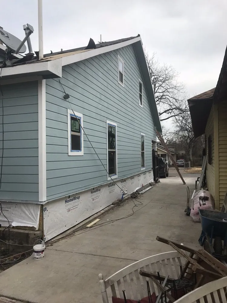 Slide of Rowe's Roofing