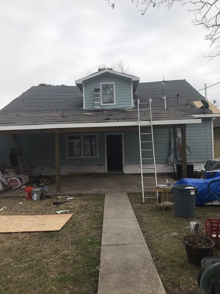 Slide of Rowe's Roofing