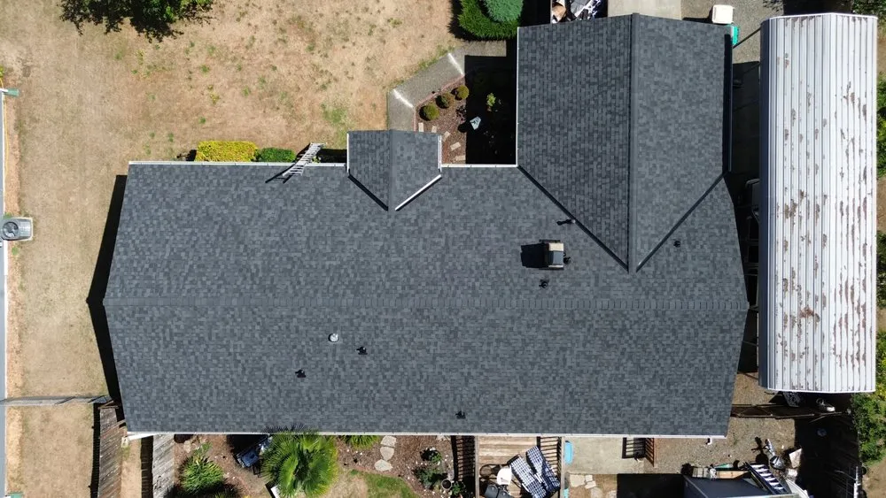 Slide of Royal Bear Roof & Gutter