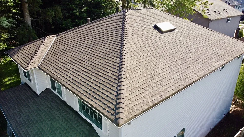 Slide of Royal Bear Roof & Gutter