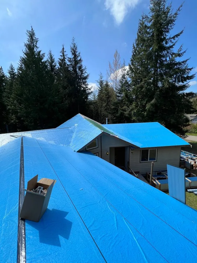 Slide of Royal Bear Roof & Gutter