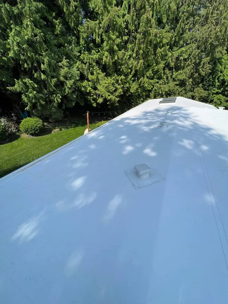 Slide of Royal Bear Roof & Gutter