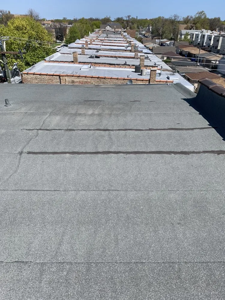 Slide of Royal Roofing and Tuckpointing