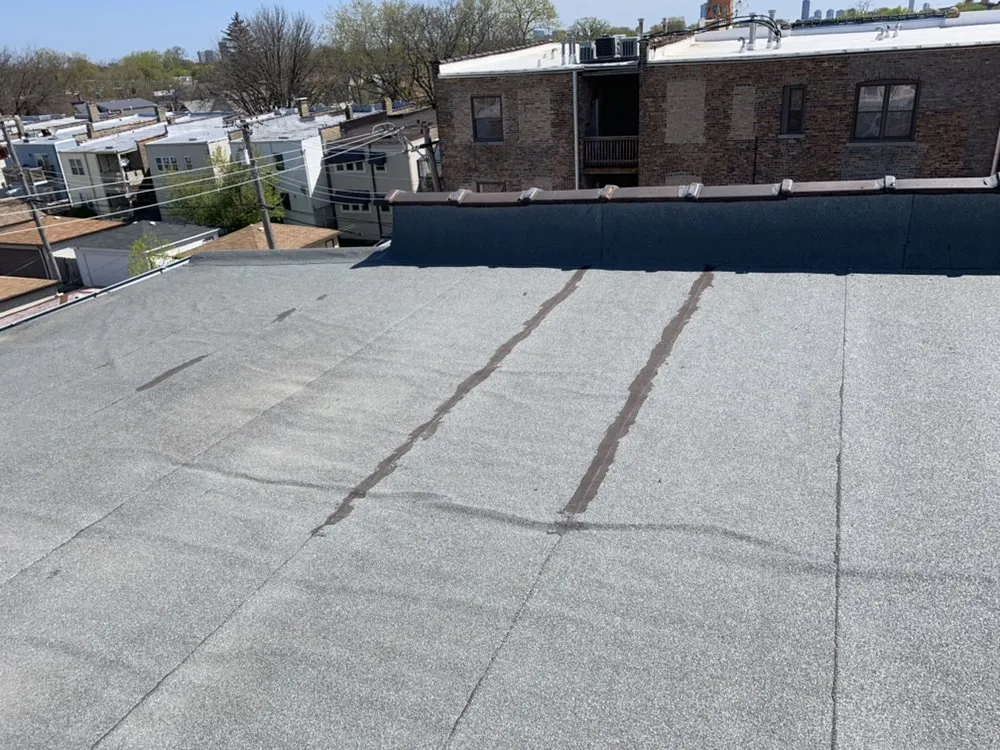 Slide of Royal Roofing and Tuckpointing