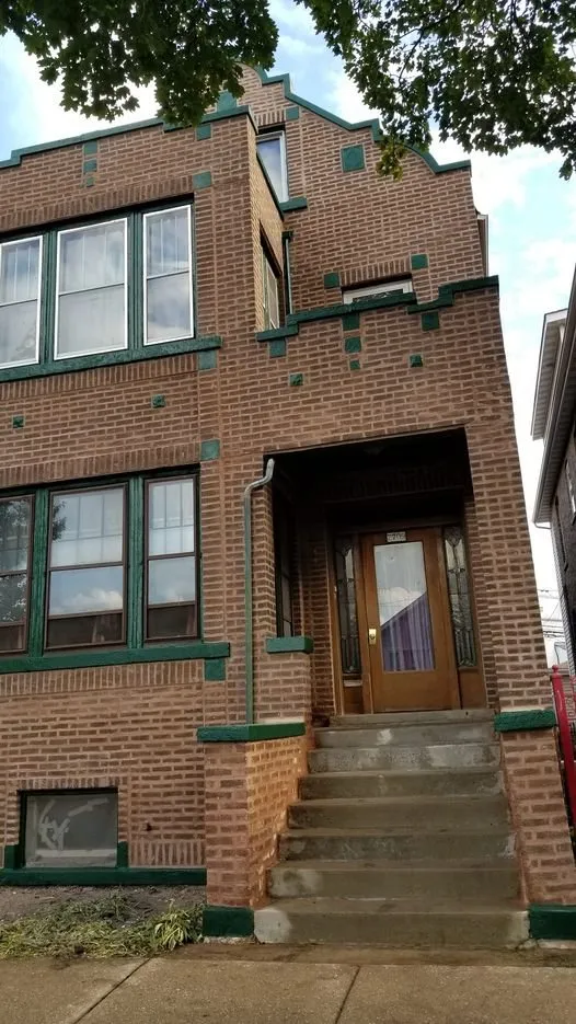 Slide of Royal Roofing and Tuckpointing