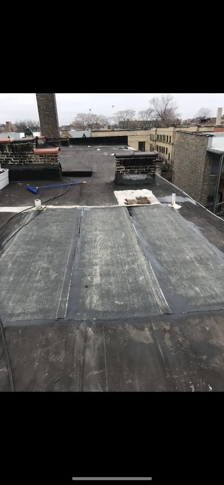 Slide of Royal Roofing and Tuckpointing