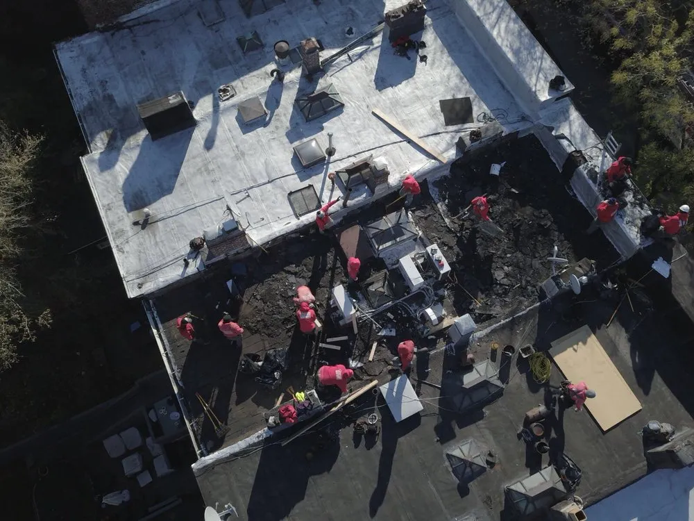 Professional flat roof repair after storm damage in Flushing, NY by Royal Roofing Queens