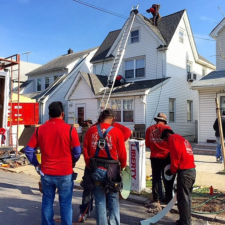 Trusted storm damage roof repair for homes in Flushing, NY by Royal Roofing Queens