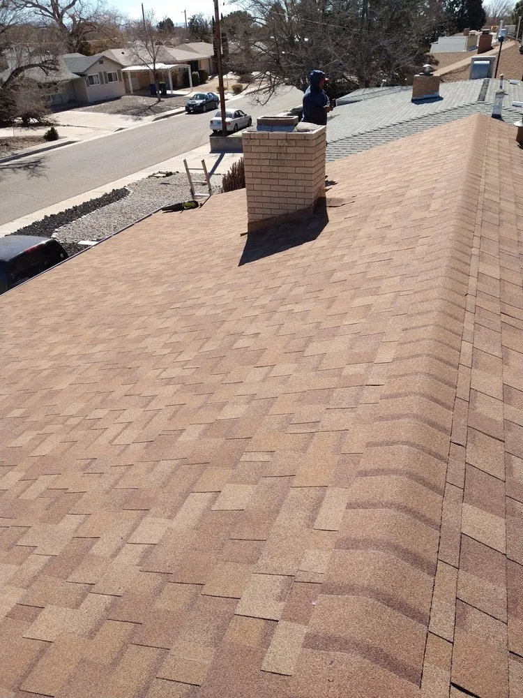 Slide of Royal's Finest Roofing