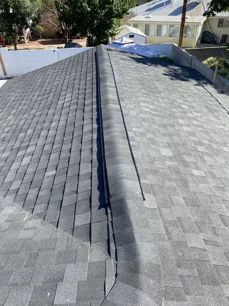 Slide of Royal's Finest Roofing