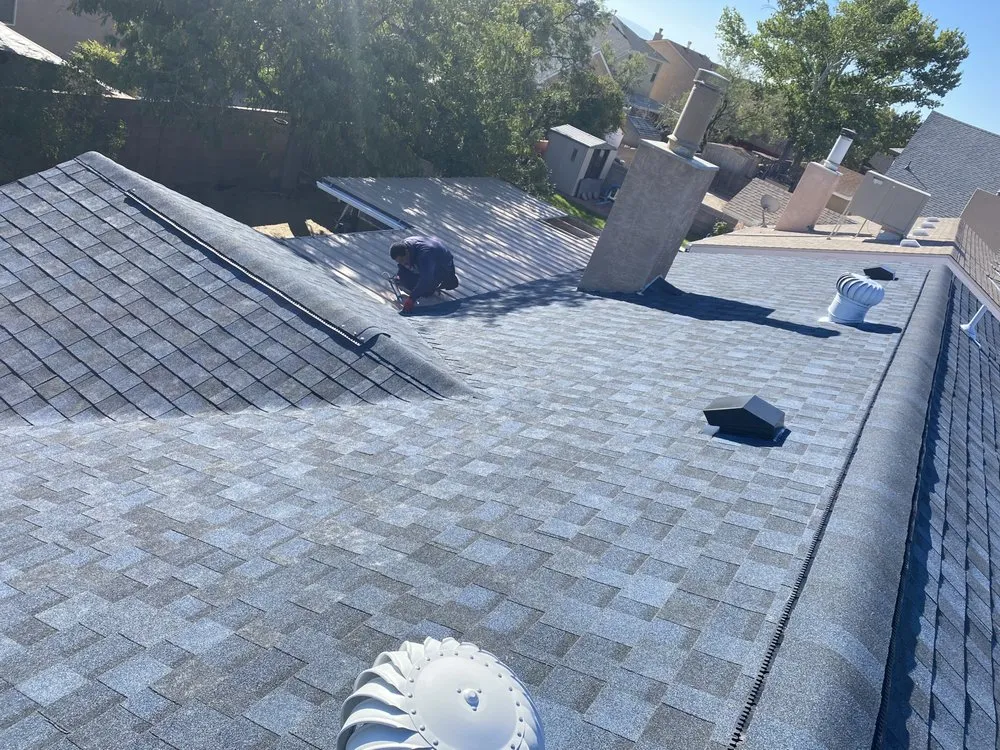 Slide of Royal's Finest Roofing