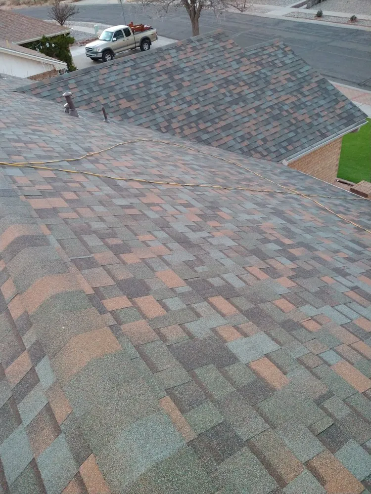 Slide of Royal's Finest Roofing