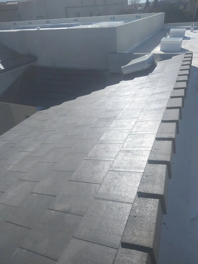 Slide of Royal's Finest Roofing