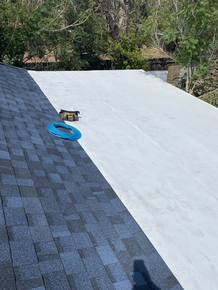 Slide of Royal's Finest Roofing