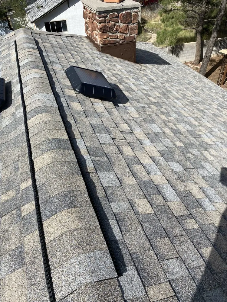 Slide of Royal's Finest Roofing