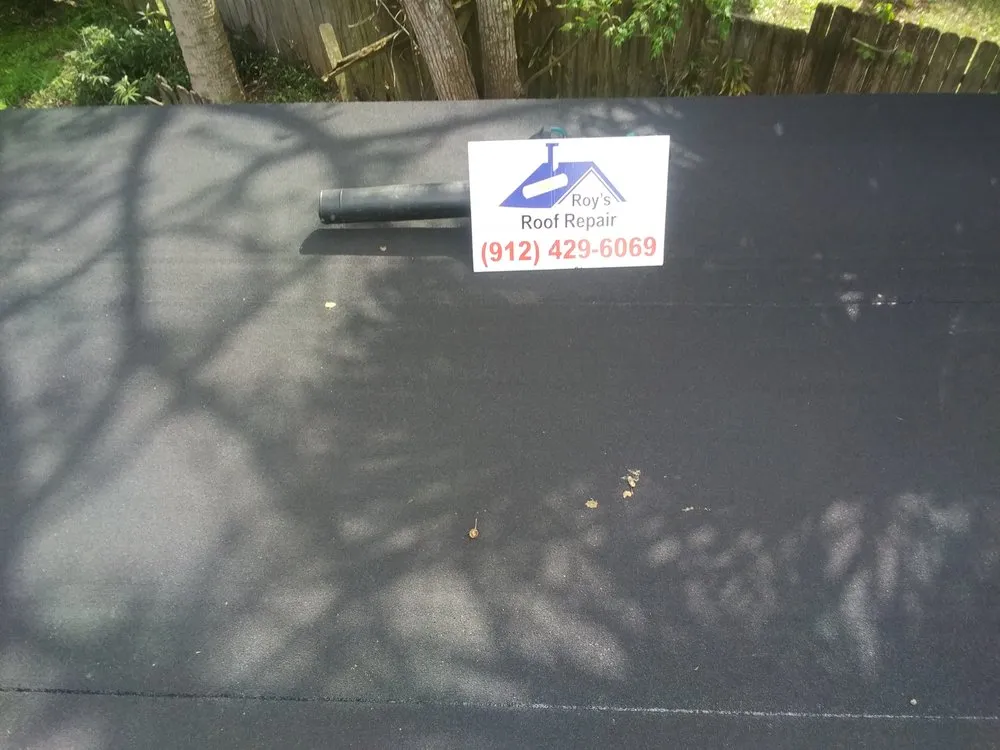 Slide of Roy's Roof Repair