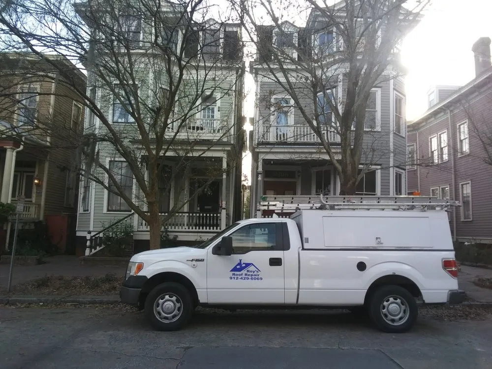 Slide of Roy's Roof Repair