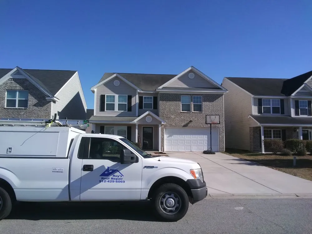 Slide of Roy's Roof Repair