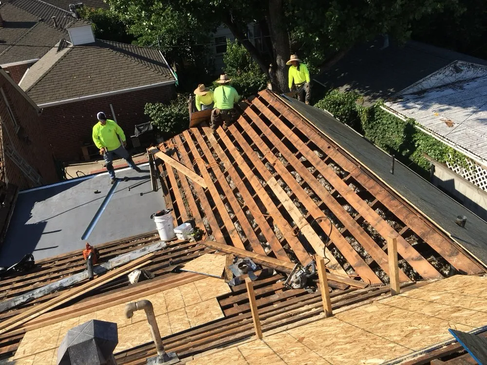 Slide of Roy's Roofing