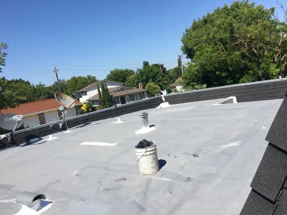 Slide of Roy's Roofing