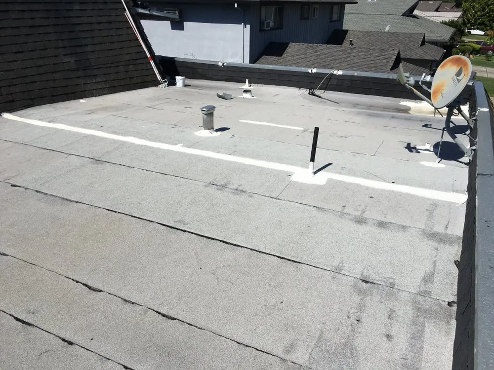 Slide of Roy's Roofing