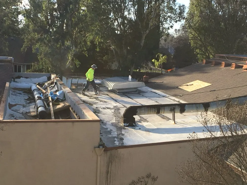 Slide of Roy's Roofing