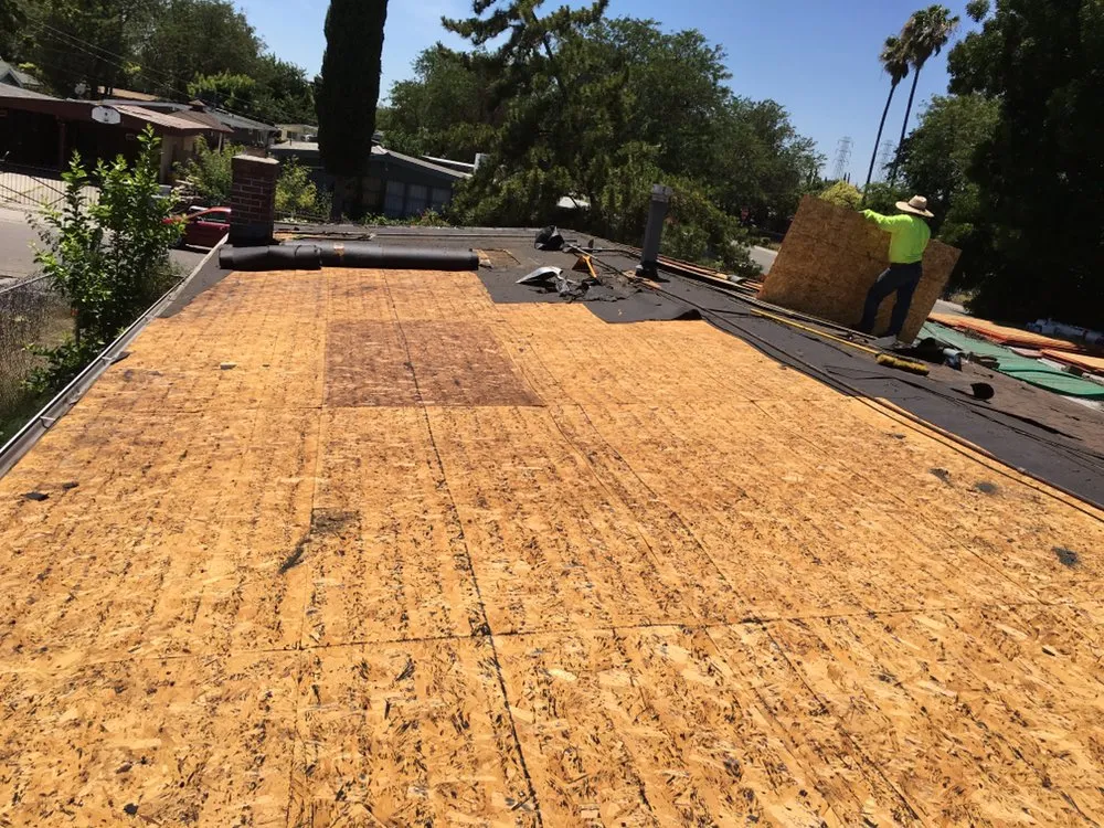 Slide of Roy's Roofing