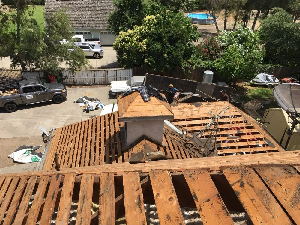 Slide of Roy's Roofing