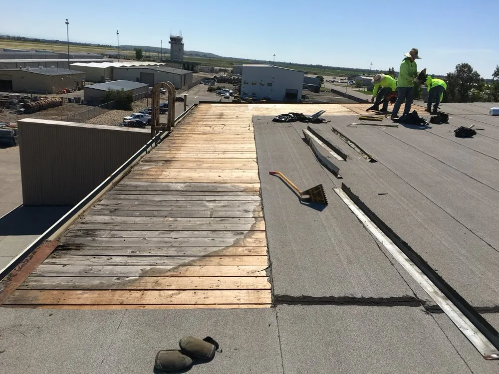 Slide of Roy's Roofing