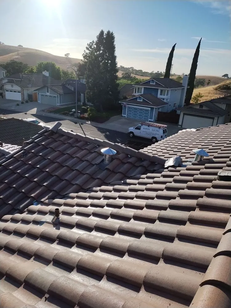 Slide of RR Alvarez Roofing