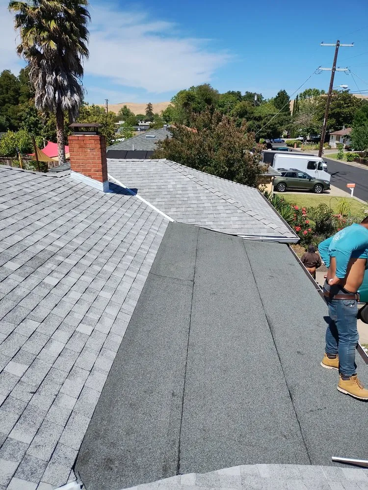 Slide of RR Alvarez Roofing